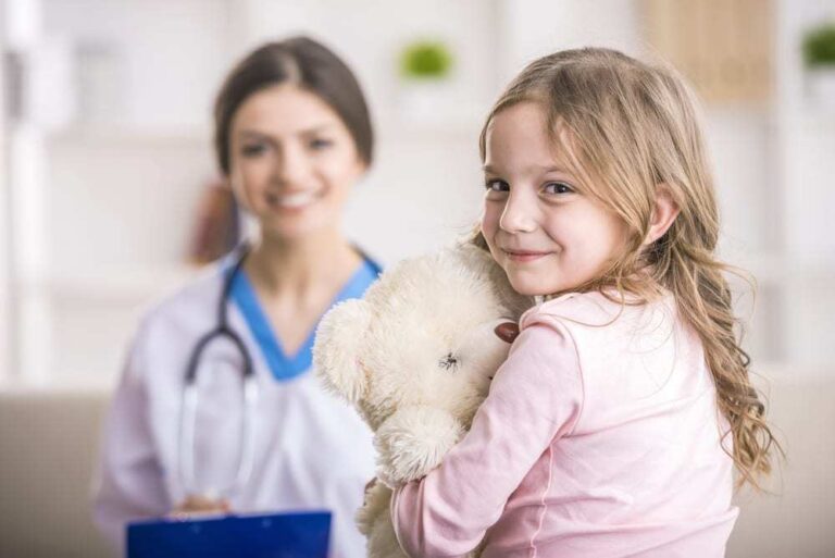 Little girl with teddy bear