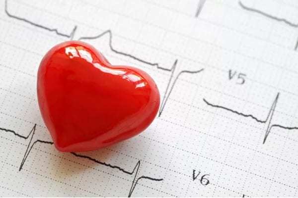 Red 3D heart on top of cardiogram pulse trace