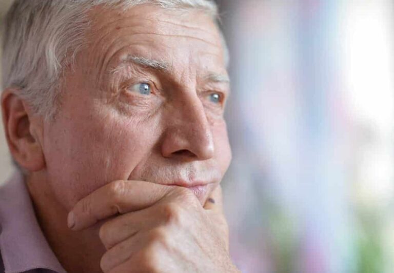 Senior man with thoughtful, worried expression