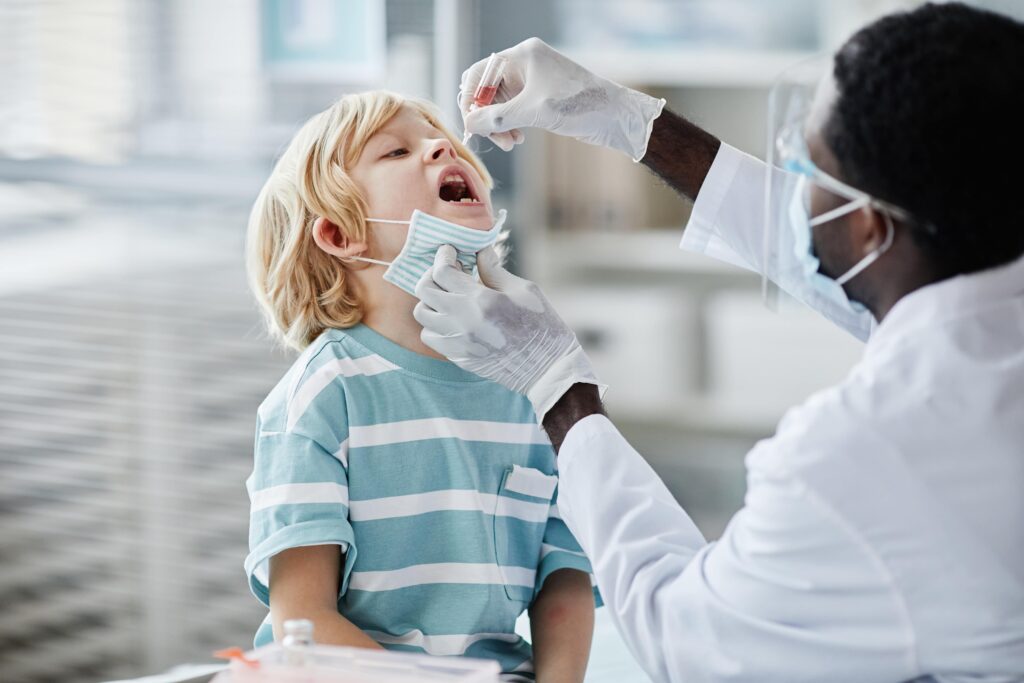 Young-boy-receiving-oral-vaccine