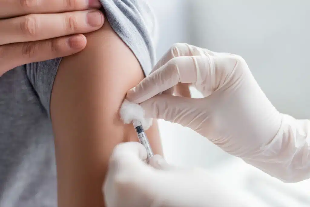 Cropped-view-of-medical-professional-giving-adult-patient-a-vaccine