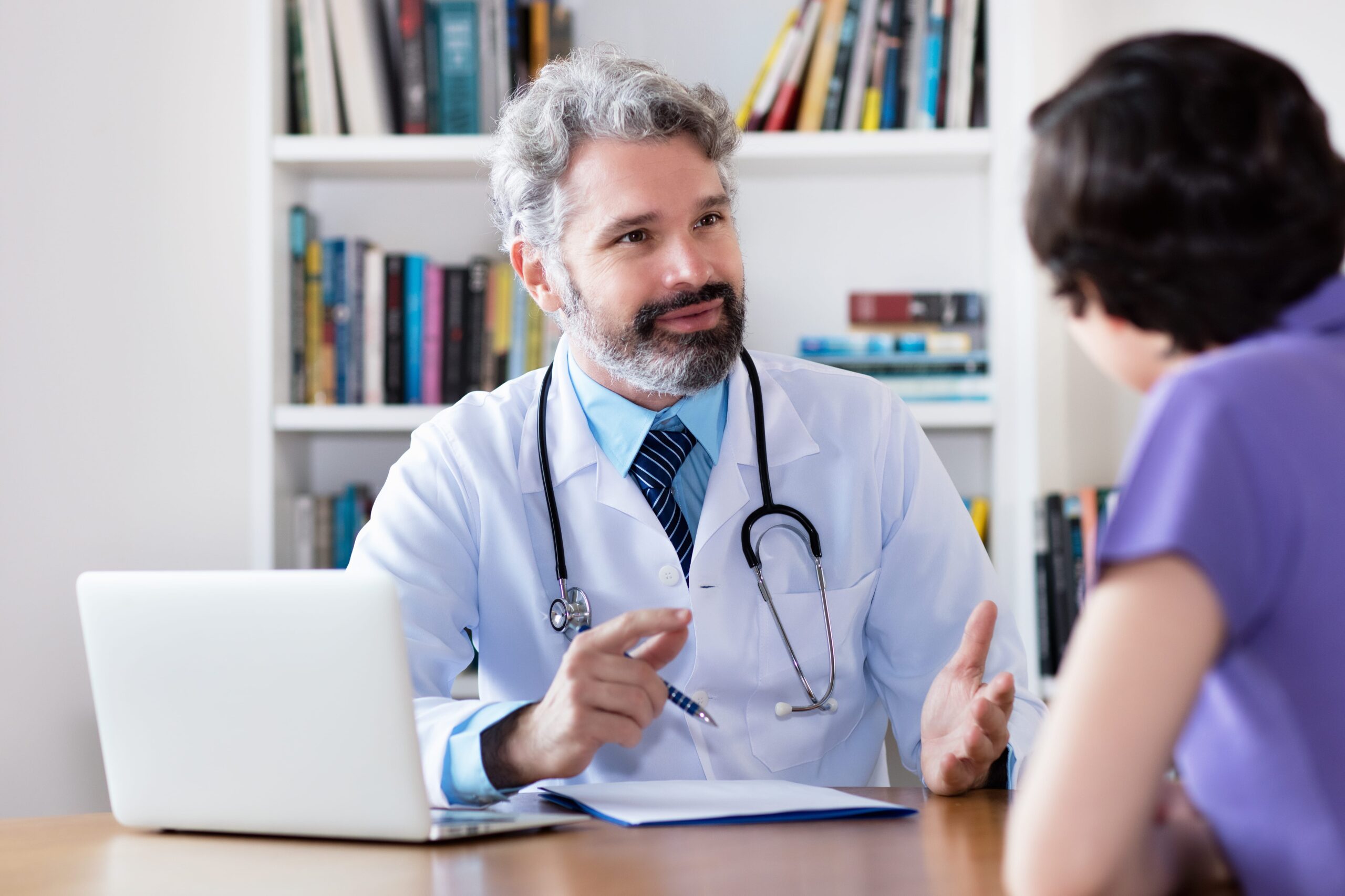 Doctor talking with patient