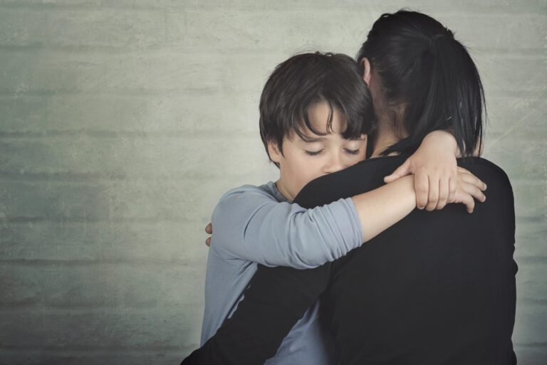 Child hugging mom