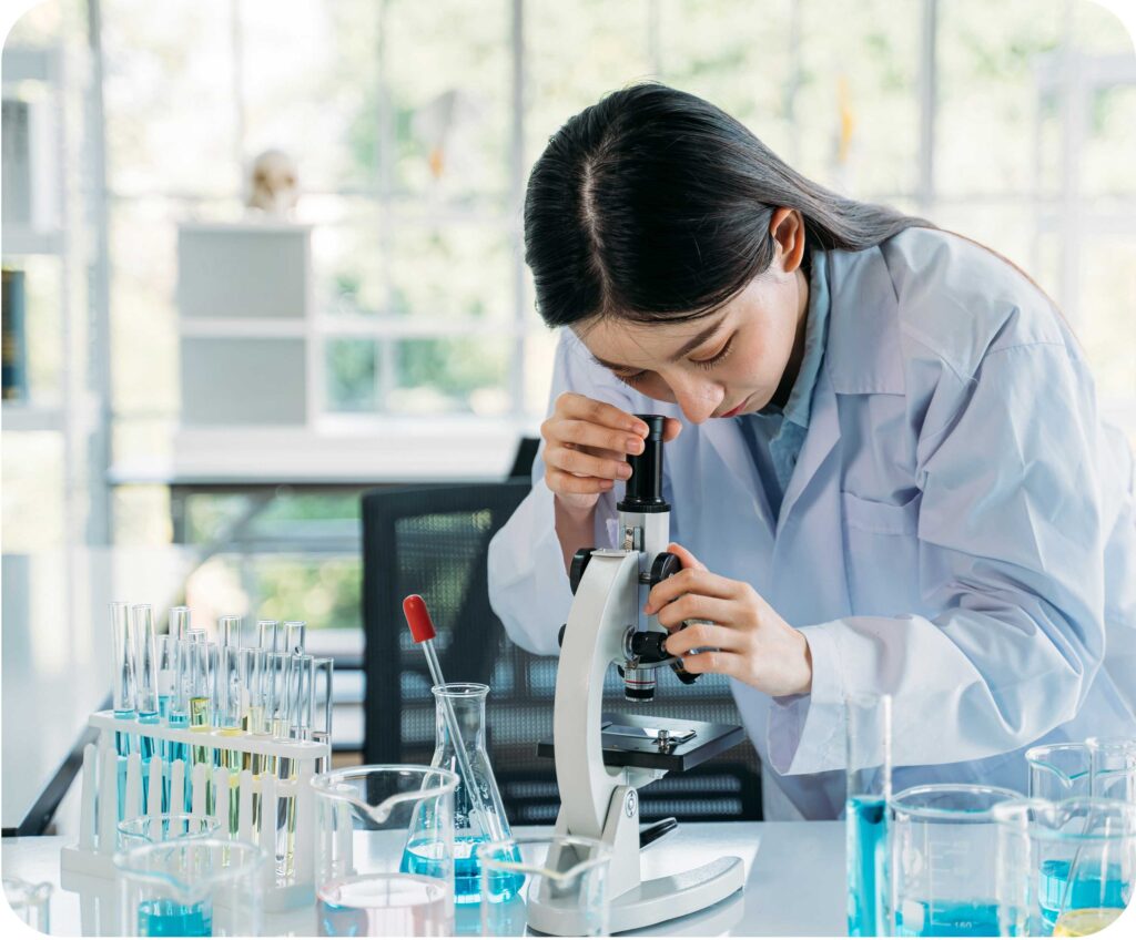 woman-looking-thru-microsope-rounded-edges