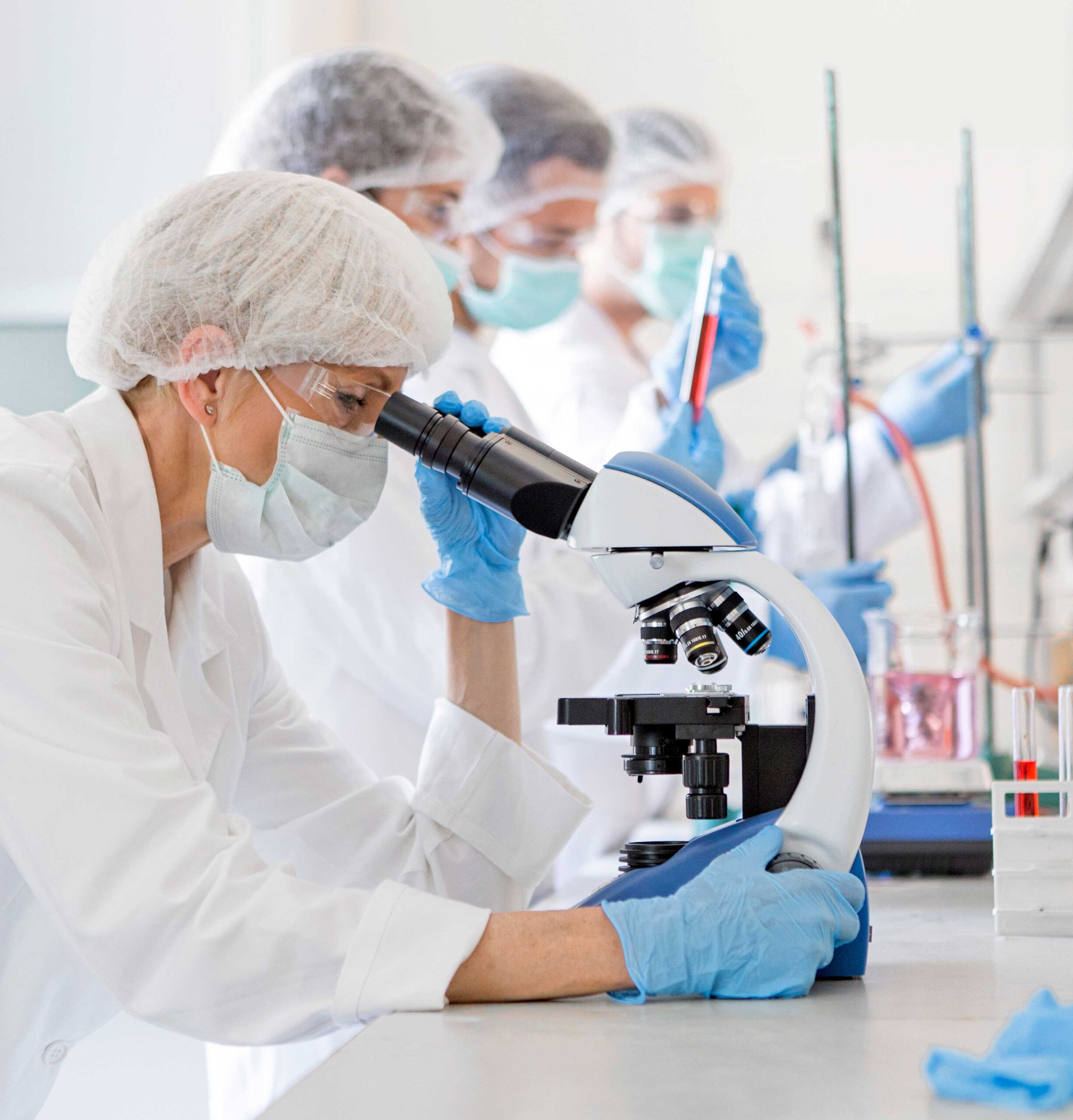 lab-workers-with-microscope