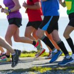 Runners in a marathon, cropped to show shoulders down