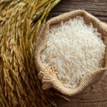 Bowl of rice in burlap sack
