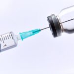 vaccine vial with syringe