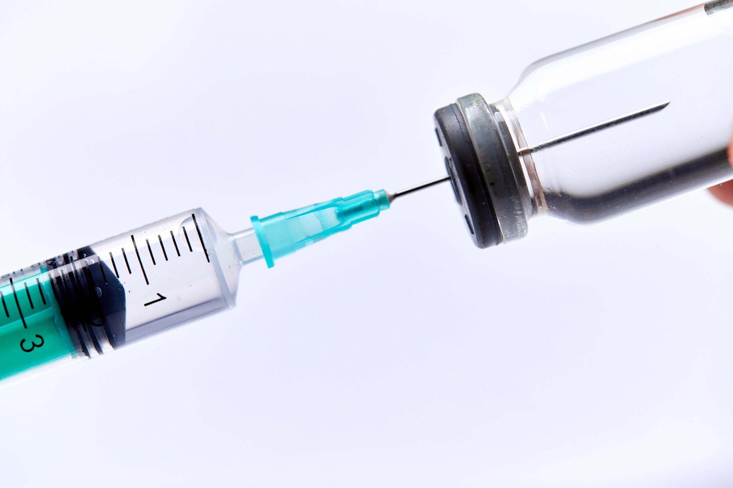 vaccine vial with syringe