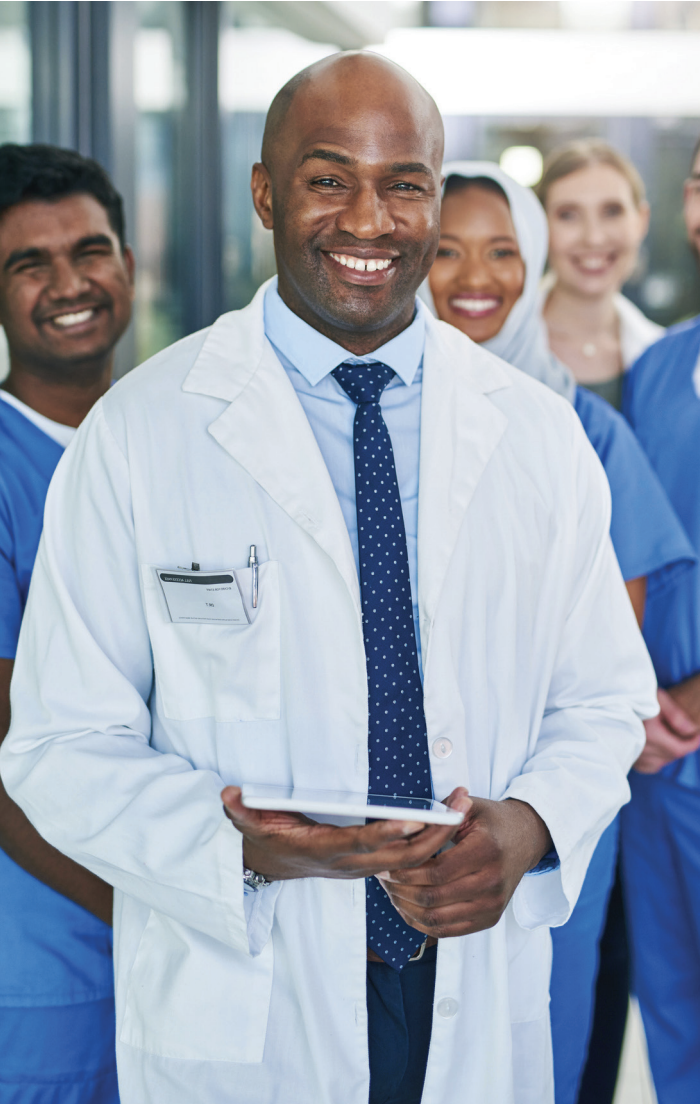 QPS Whitepaper: Man in lab gown