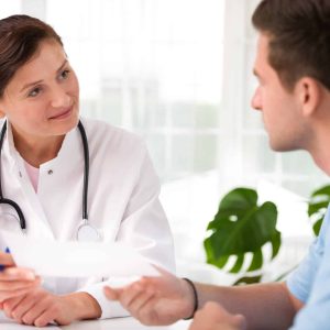 Doctor with male patient